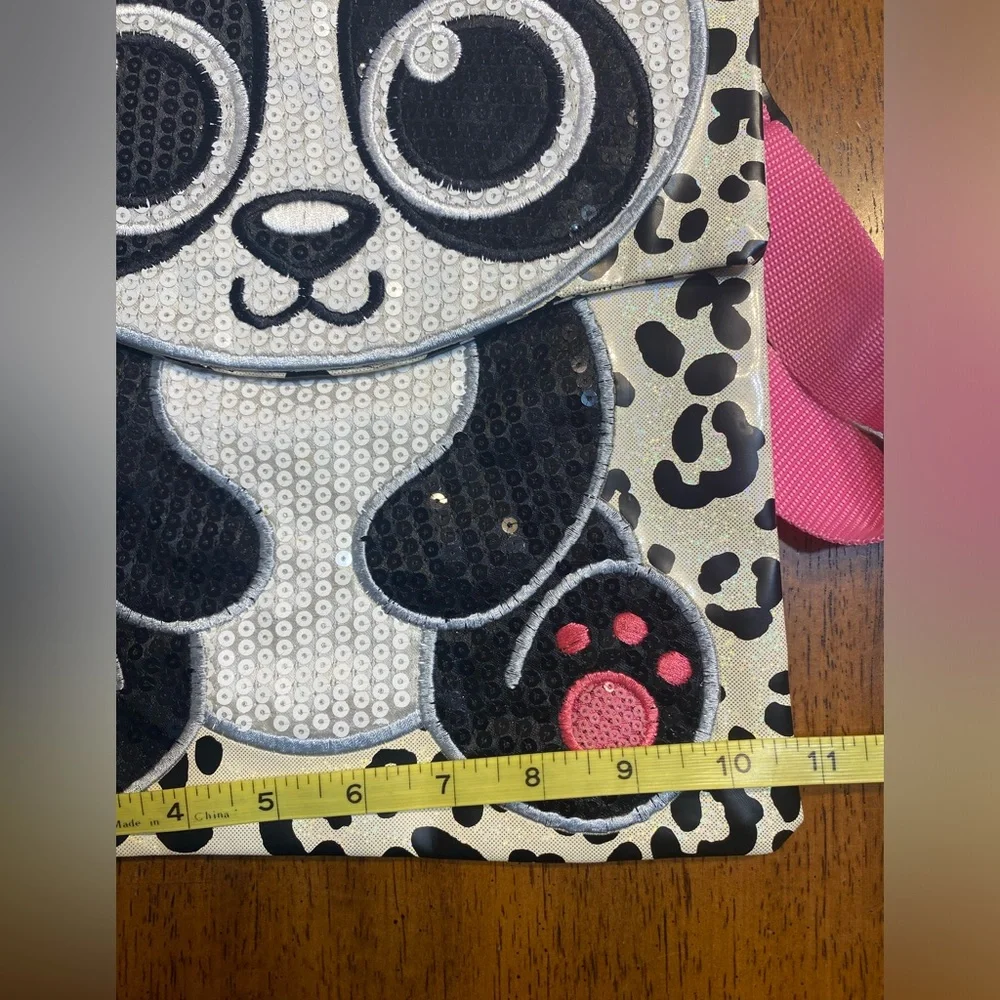 Justice panda messenger bag. Perfect for iPad or Chromebook.